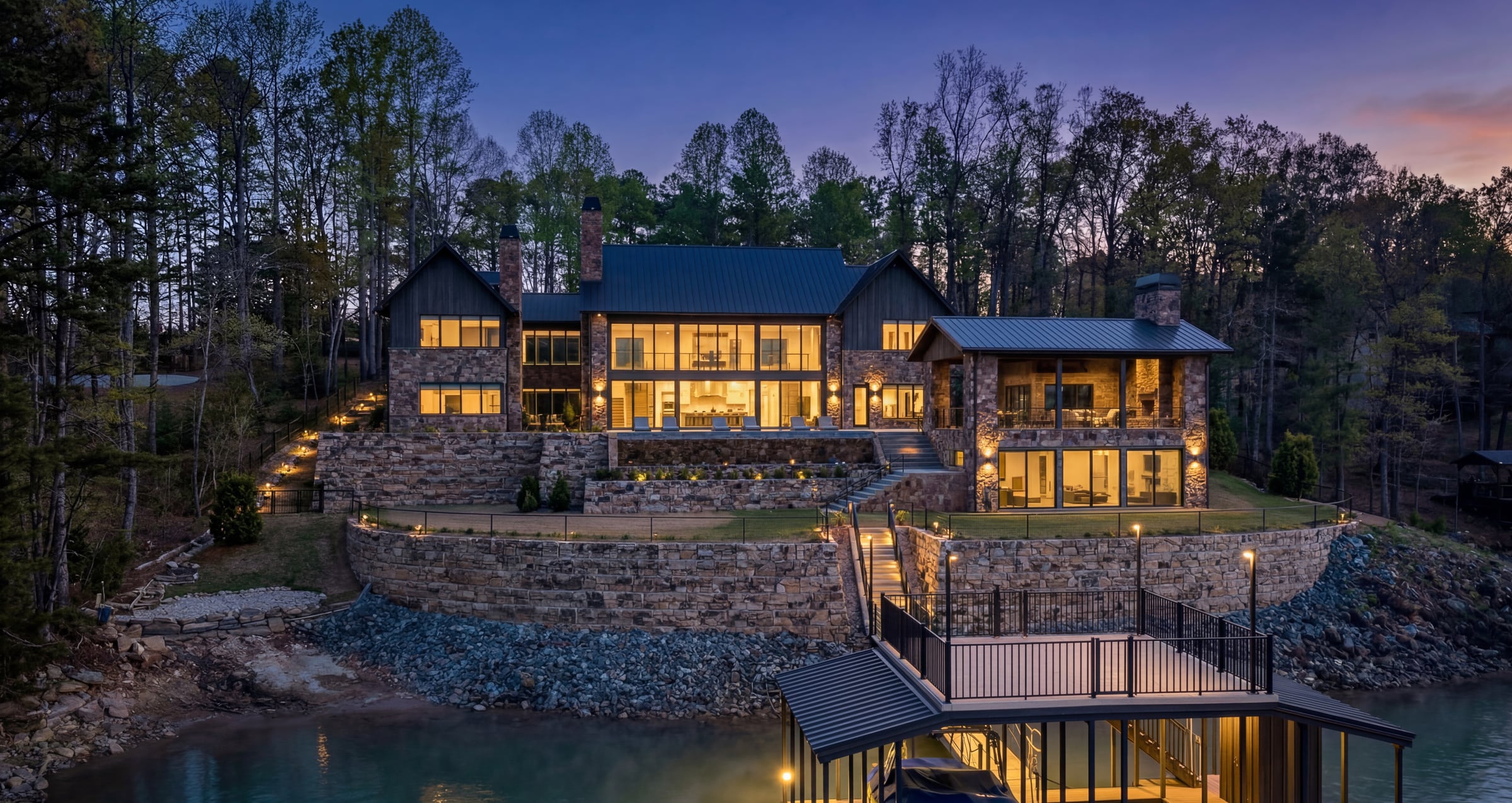 Lakefront custom home at daybreak